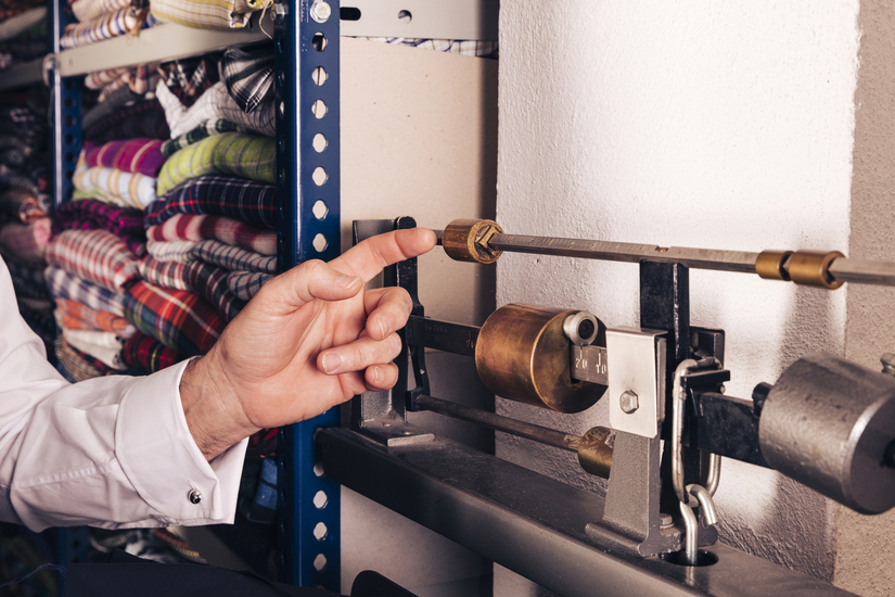 close-up-man-s-hand-touching-vintage-machine