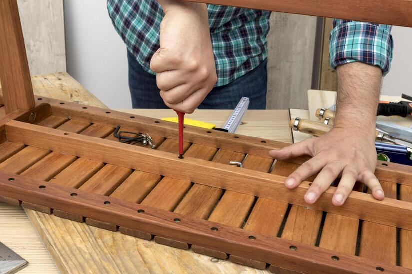 front-view-carpenter-working-his-workshop